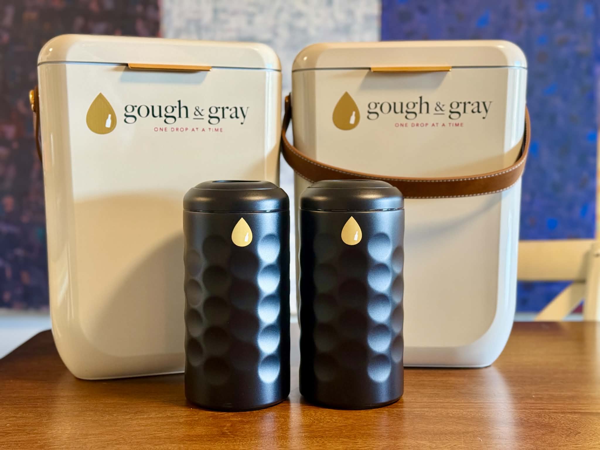 Gough and gray wine coolers in front of their customised cooler boxes