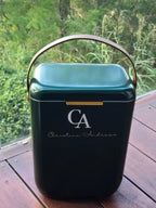 Green cooler box with brown handle